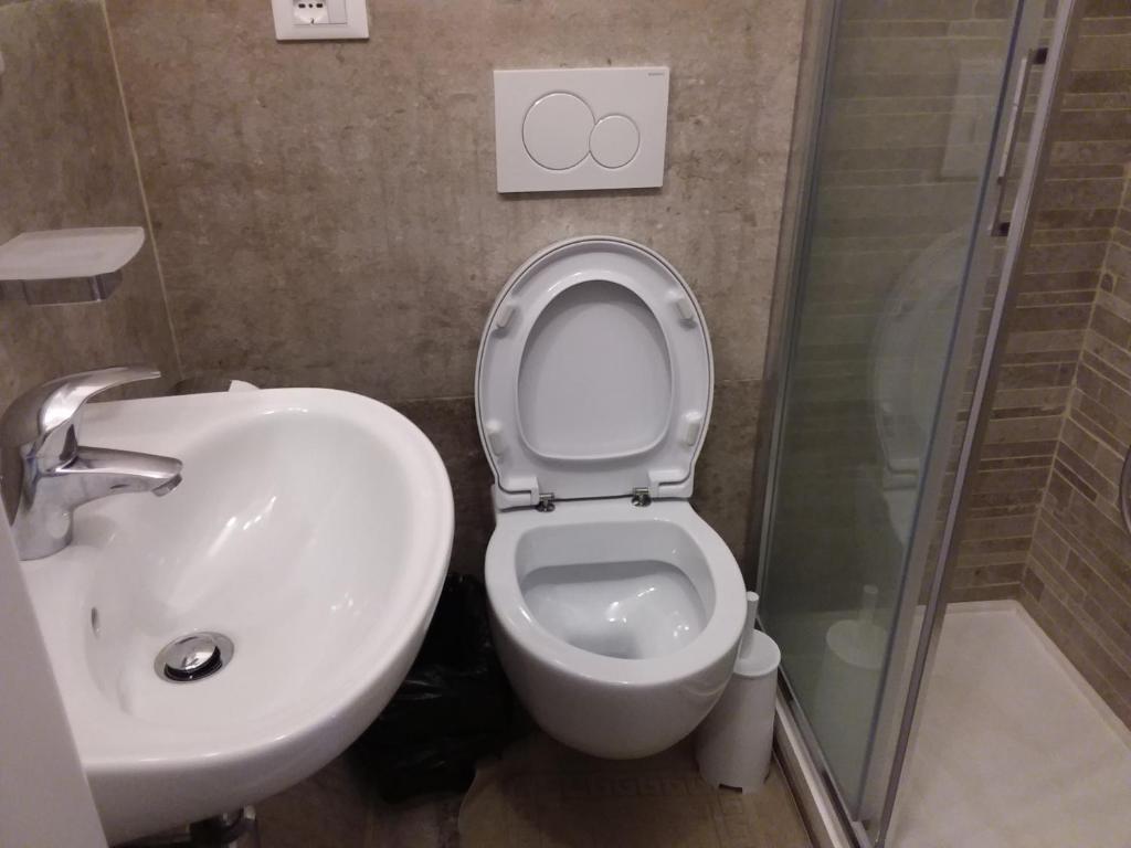 Koupelna v ubytování Rina Rooms