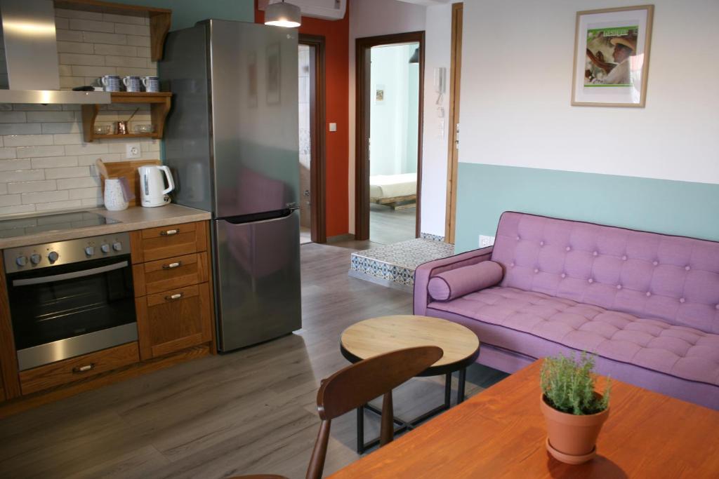 Kuchyň nebo kuchyňský kout v ubytování Aphelion Holiday Apartments
