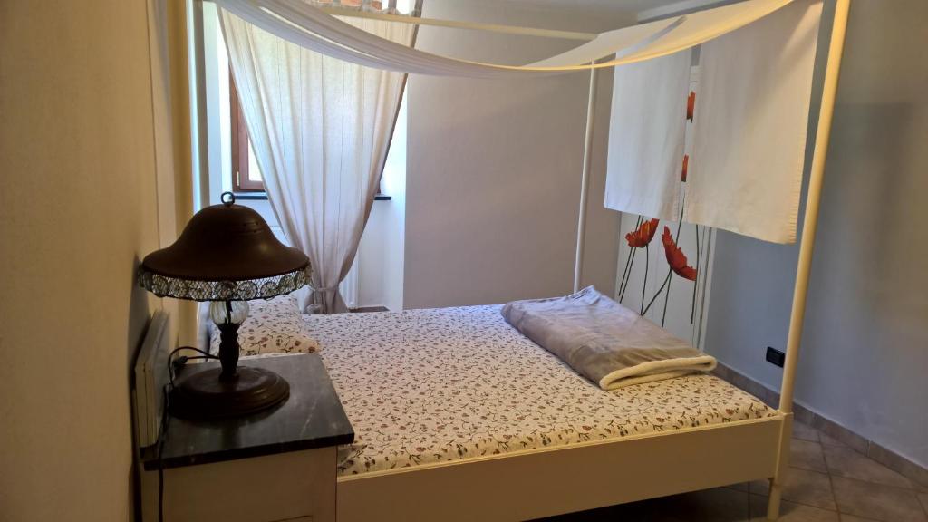 Postel nebo postele na pokoji v ubytování Casa La Rosa