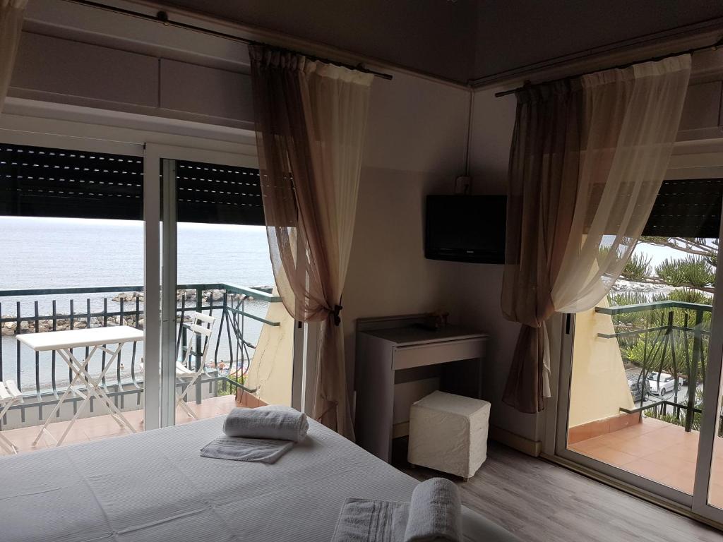 Postel nebo postele na pokoji v ubytování Hotel Zia Piera
