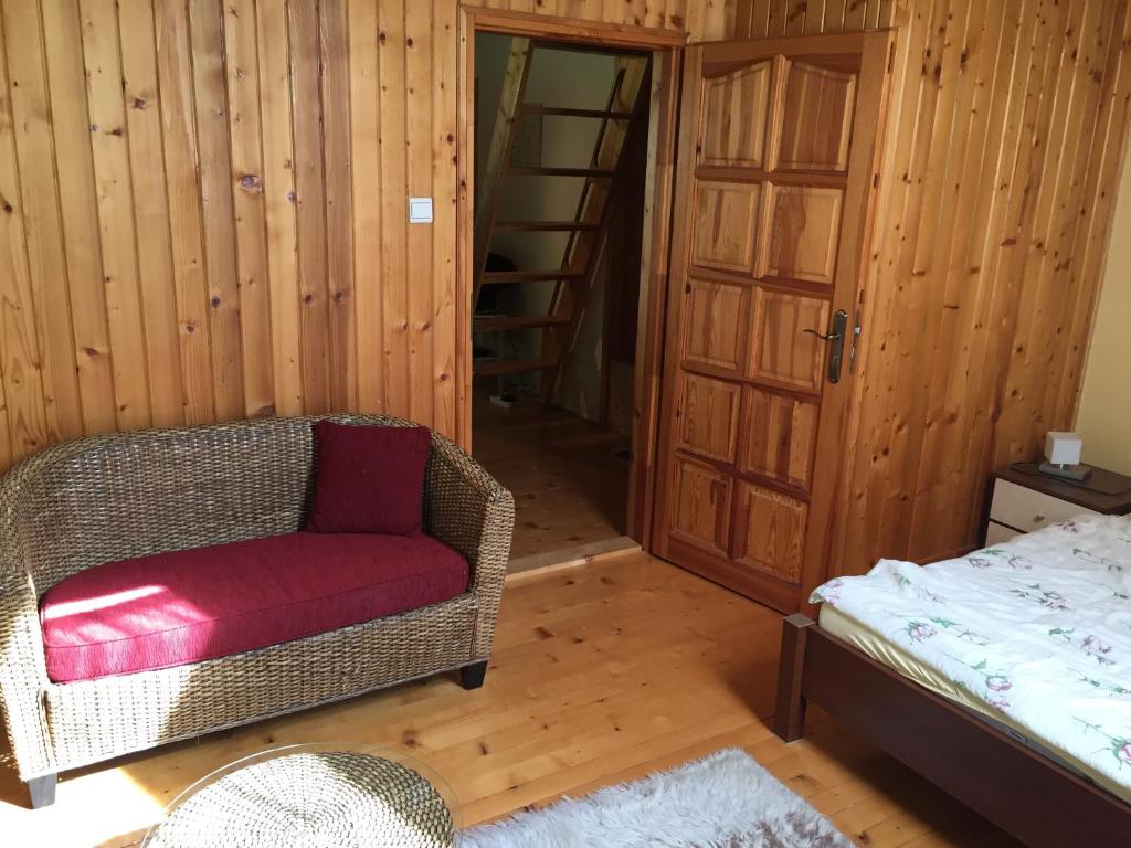 Postel nebo postele na pokoji v ubytování Apartments Huty