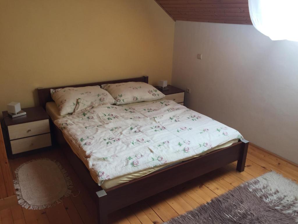 Postel nebo postele na pokoji v ubytování Apartments Huty