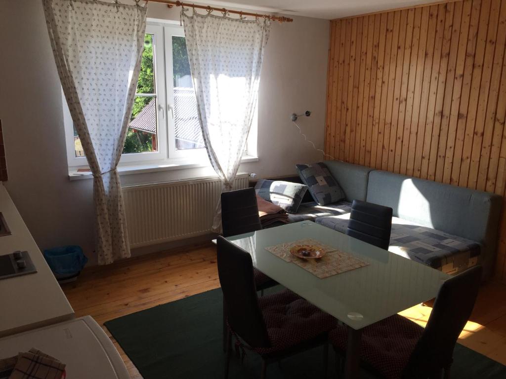 Postel nebo postele na pokoji v ubytování Apartments Huty