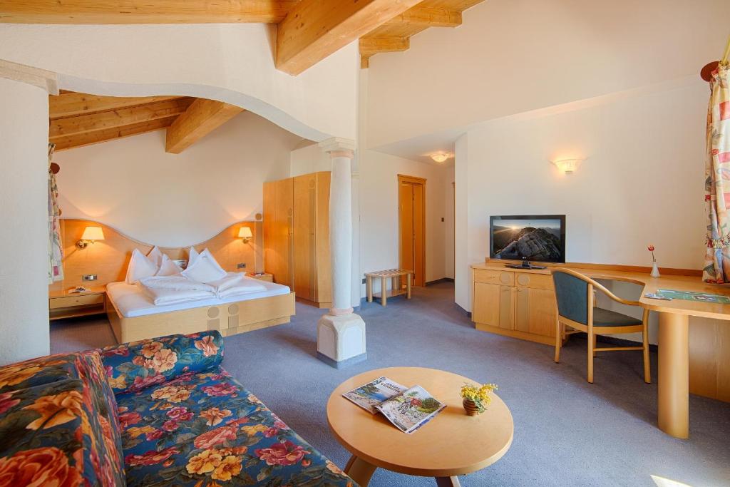 Postel nebo postele na pokoji v ubytování Hotel Gissbach