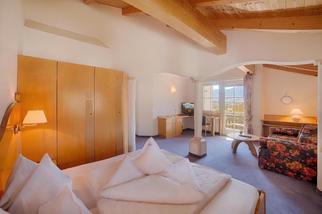 Postel nebo postele na pokoji v ubytování Hotel Gissbach