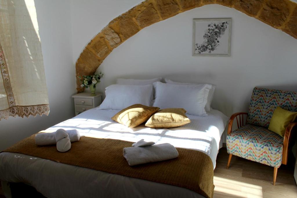 Giường trong phòng chung tại Pedieos Guest House