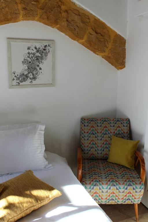 Postel nebo postele na pokoji v ubytování Pedieos Guest House