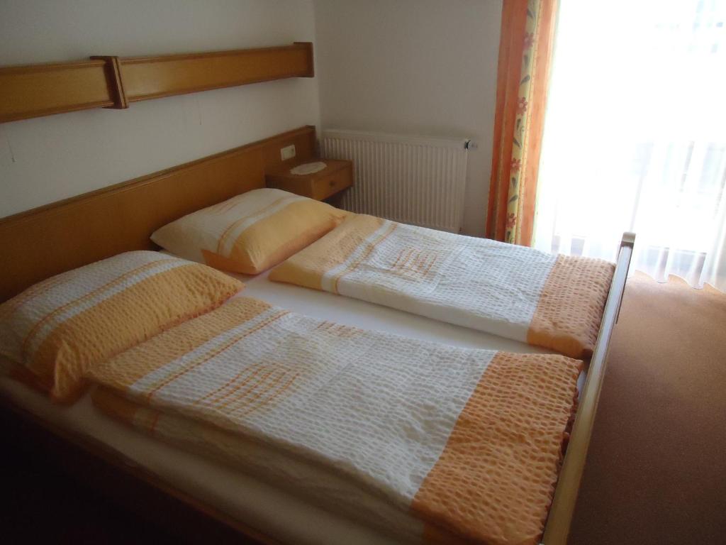 Postel nebo postele na pokoji v ubytování Pension Wald