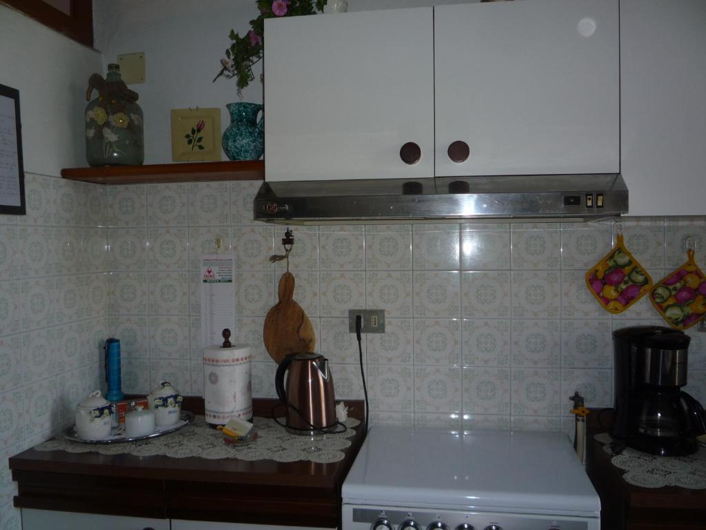 Kuchyň nebo kuchyňský kout v ubytování Casa Tarrini