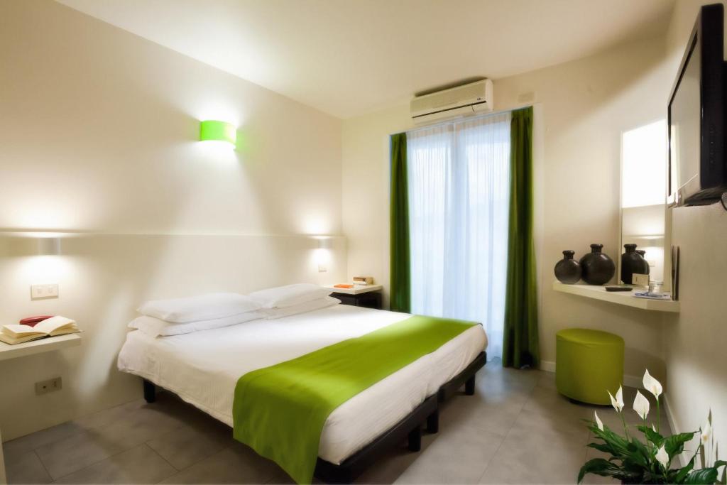 Postel nebo postele na pokoji v ubytování Hotel Garden Sea Wellness & Spa 4 stelle superior