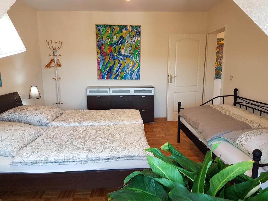 Letto o letti in una camera di Villa Weitblick