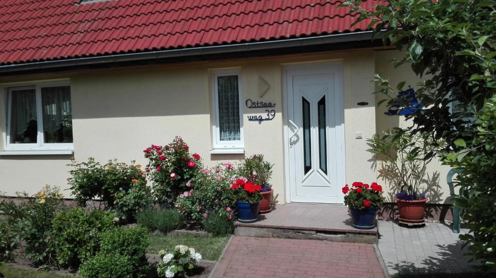 Κήπος έξω από το Ferienwohnung Kleine Moewe