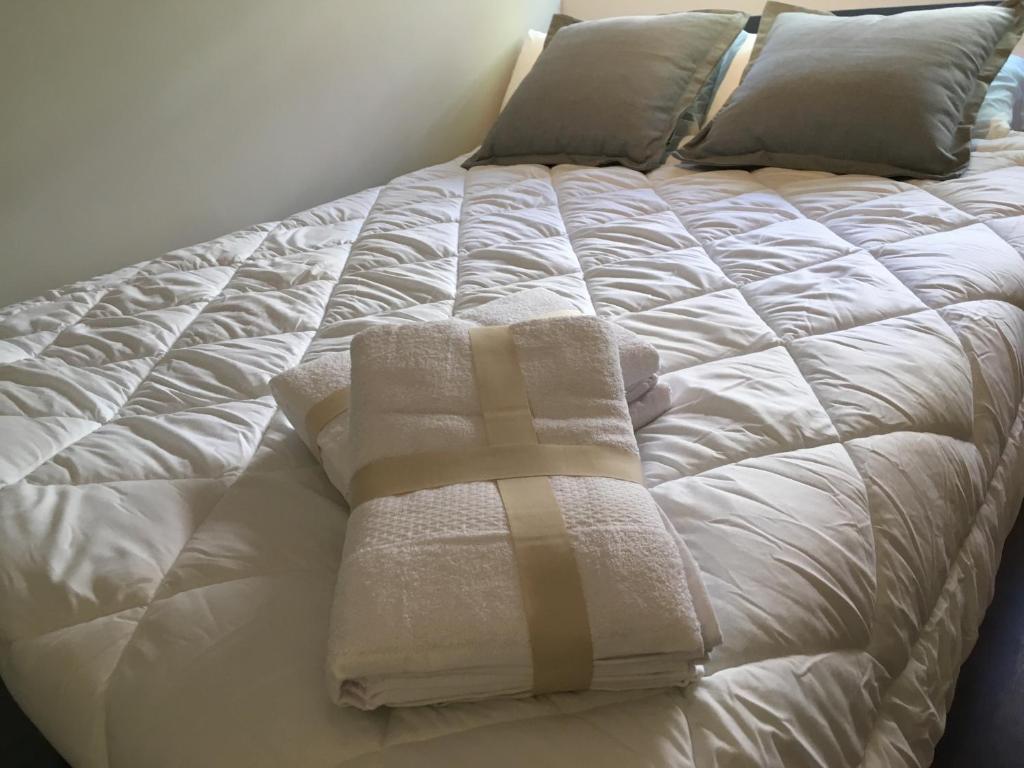 Postel nebo postele na pokoji v ubytování La Pinilla Ski Apartment