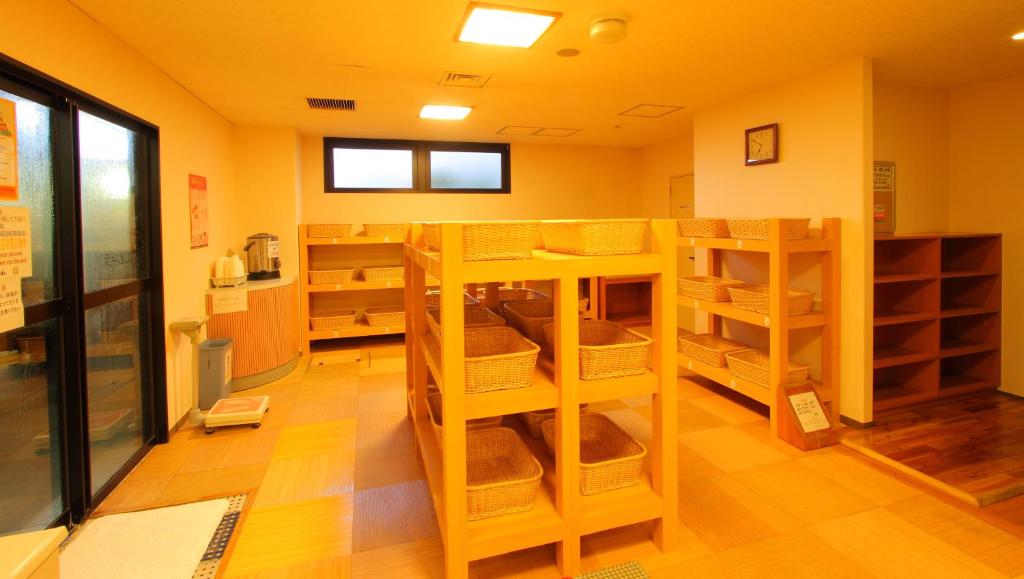 Palanda nebo palandy na pokoji v ubytování Hotel Hana Isawa