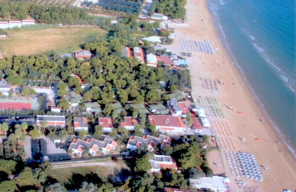 an aerial view of a resort and a beach at La Marina Bay in Vieste