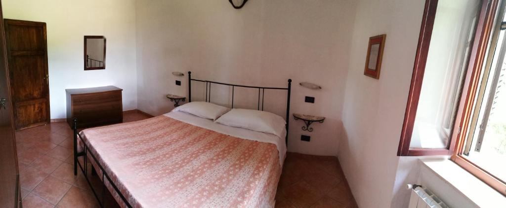 Postel nebo postele na pokoji v ubytování I Castagnini