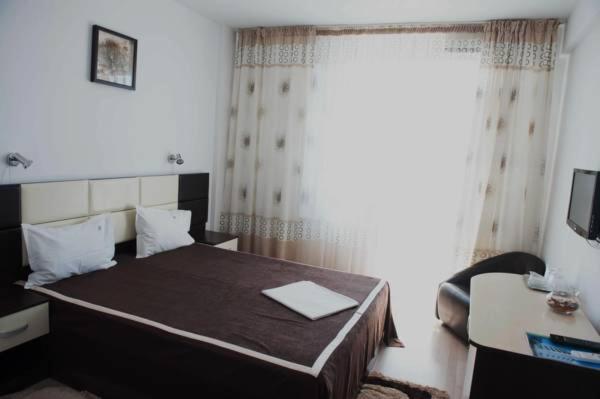 Postel nebo postele na pokoji v ubytování Hotel Clas