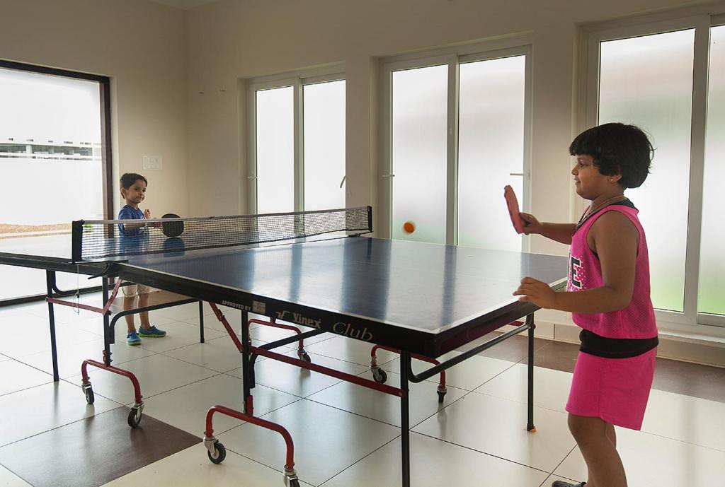Stolní tenis v ubytování Le Coffee Resort nebo okolí