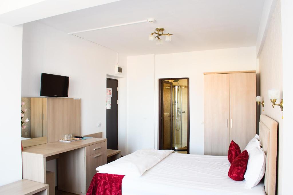 Postel nebo postele na pokoji v ubytování Hotel Clas