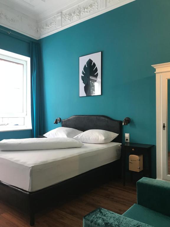 Postel nebo postele na pokoji v ubytování SmartHotel Mystique Self check-in