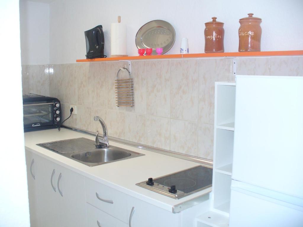 Kuchyň nebo kuchyňský kout v ubytování Casa Maria
