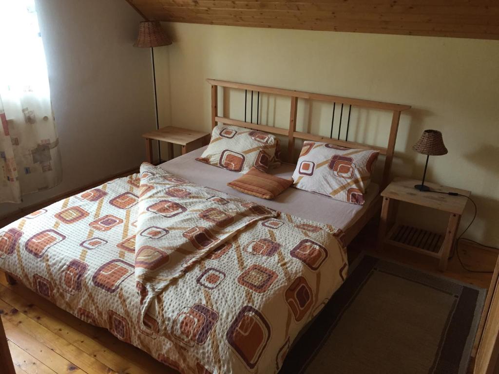 Postel nebo postele na pokoji v ubytování Apartments Huty