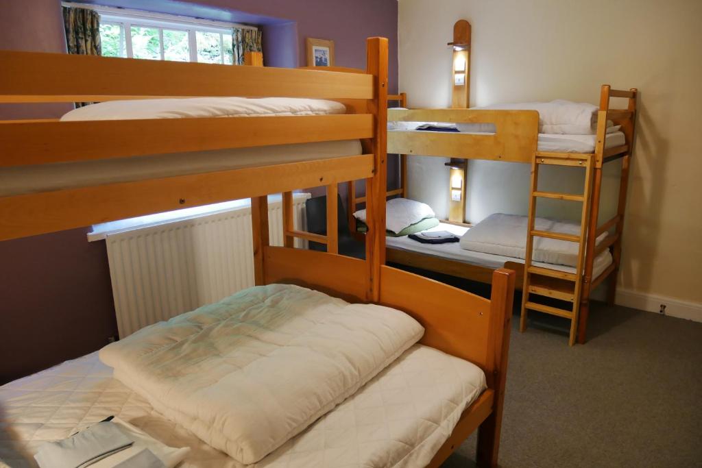 Postel nebo postele na pokoji v ubytování Elterwater Hostel