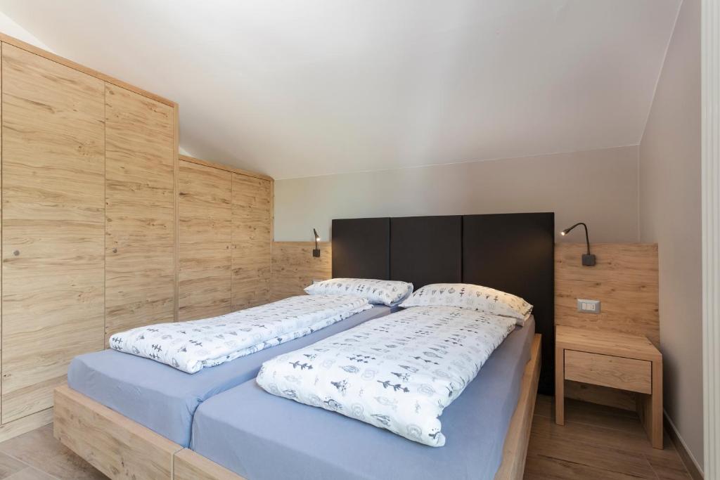 Postel nebo postele na pokoji v ubytování Residenza Al Cadin