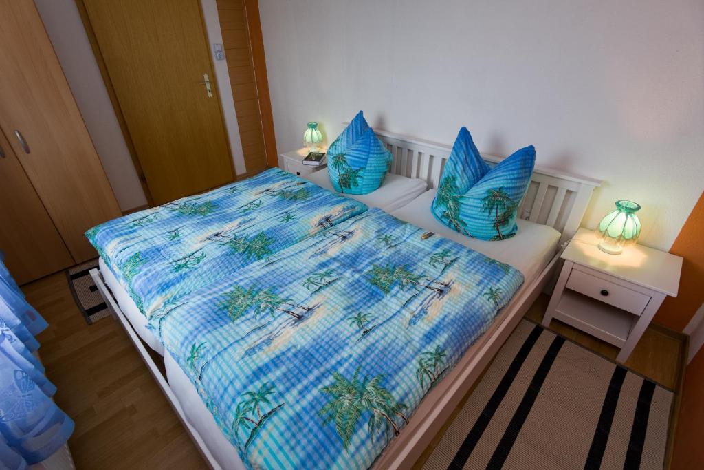 Postel nebo postele na pokoji v ubytování Harzurlaub Heyder