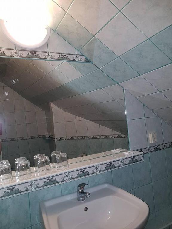 A bathroom at Penzión KORMOŠ