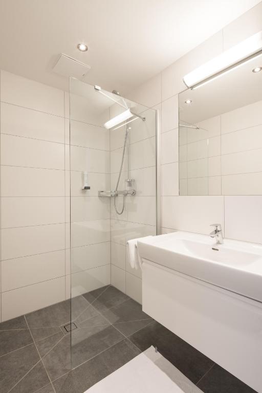 Kúpeľňa v ubytovaní Appartements Insieme