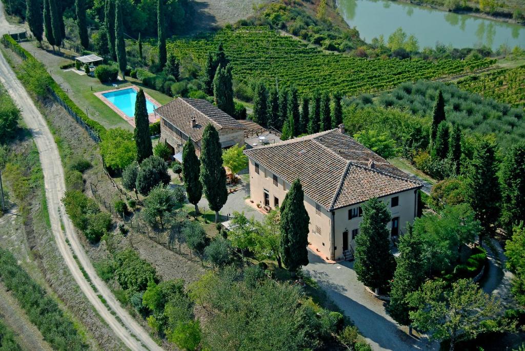 an aerial view of a house in a vineyard at Podere Remignoli in San Gimignano