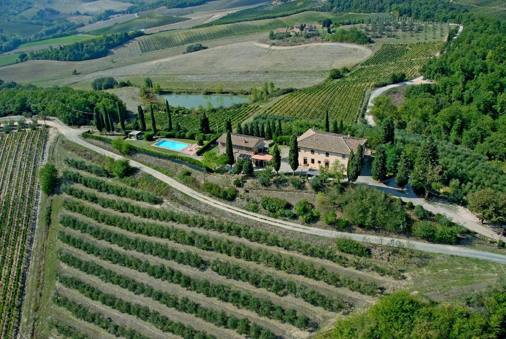 an aerial view of a house in a vineyard at Podere Remignoli in San Gimignano