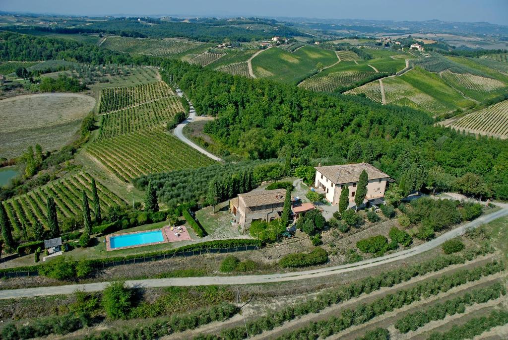 an aerial view of a house in a vineyard at Podere Remignoli in San Gimignano