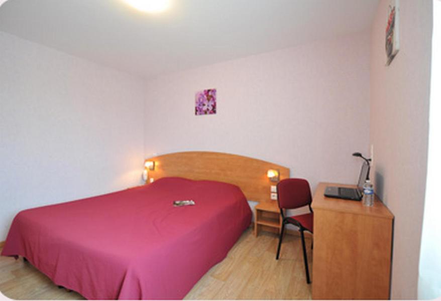 Postel nebo postele na pokoji v ubytování Prim Hotel Reims