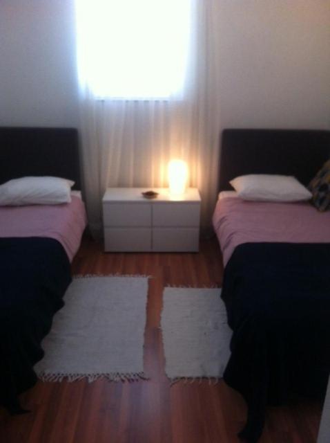 Postel nebo postele na pokoji v ubytování Villa Casabianca