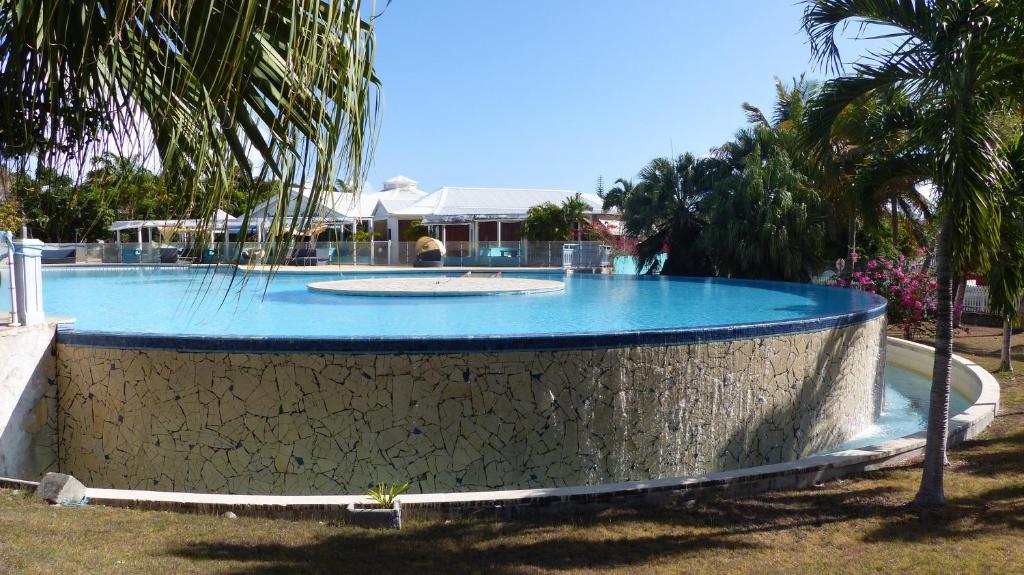 Bazén v ubytování Appartement à la Résidence LA PLANTATION RESORT and SPA nebo v jeho okolí