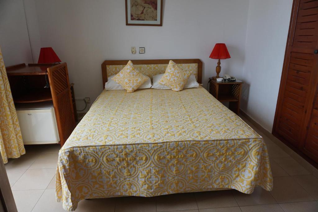 Postel nebo postele na pokoji v ubytování Hotel Zelis