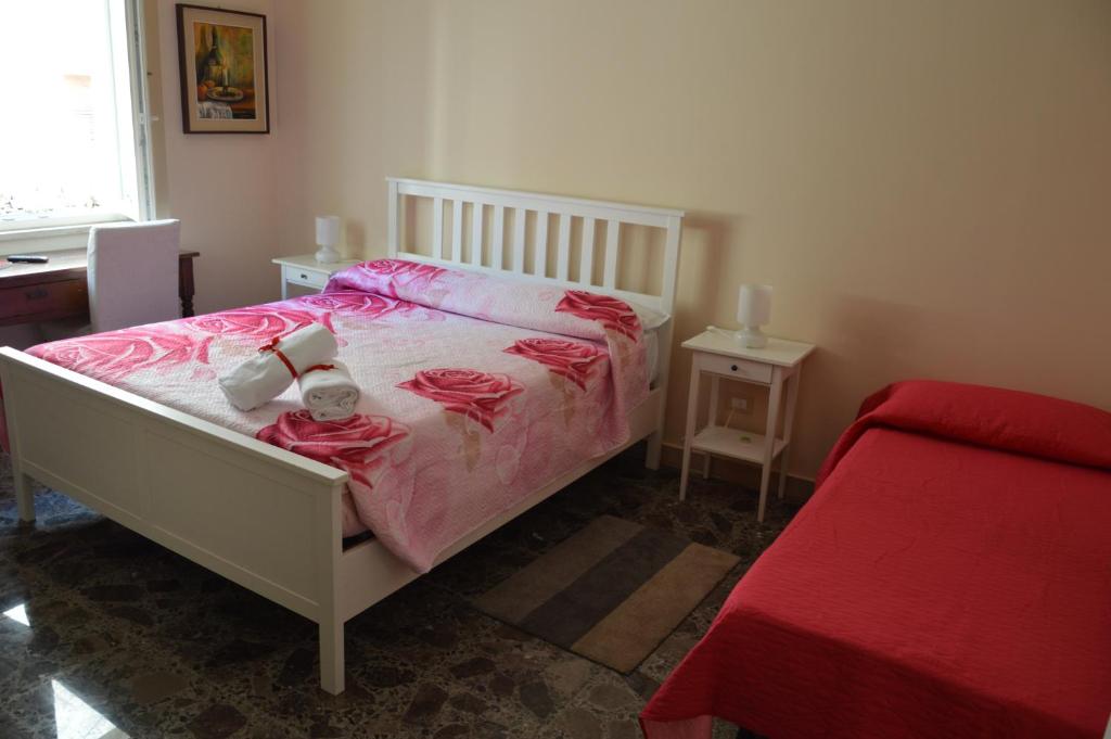 Postel nebo postele na pokoji v ubytování B&B Cumpari Turiddu