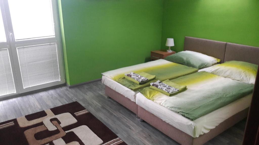 Posteľ alebo postele v izbe v ubytovaní Ubytovanie House