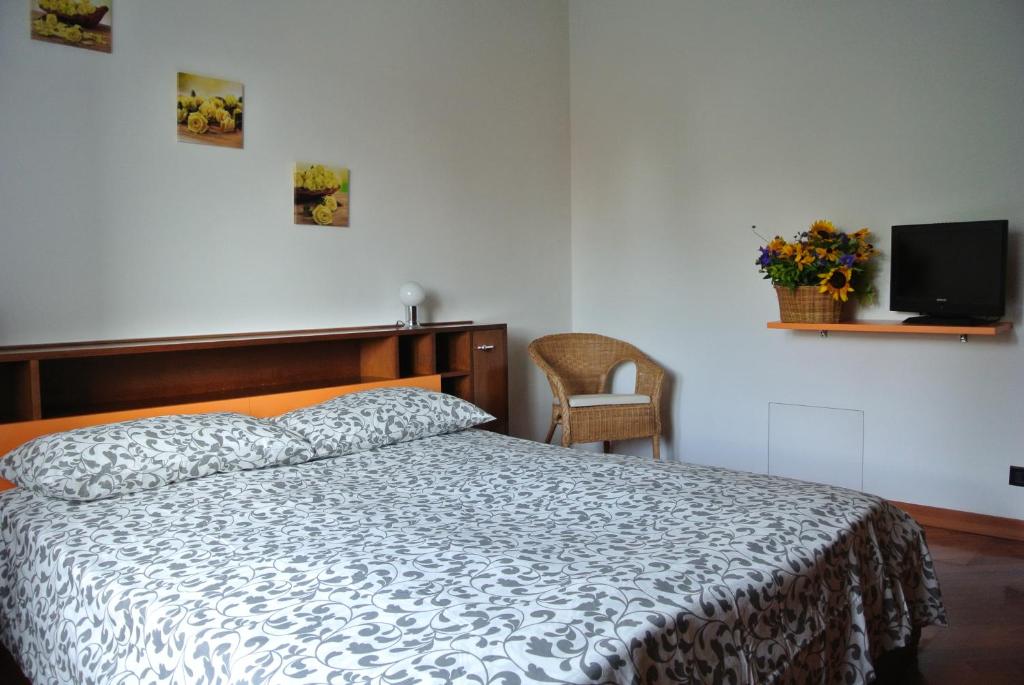 Postel nebo postele na pokoji v ubytování B&B SARI