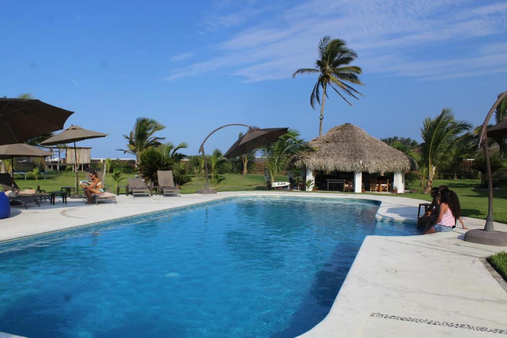 Bazén v ubytování Hotel Taboga Eco Boutique & Spa Costa Esmeralda nebo v jeho okolí