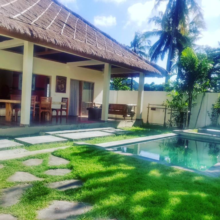 Bazén v ubytování Tiki Boutique Hotel Spa Lombok nebo v jeho okolí