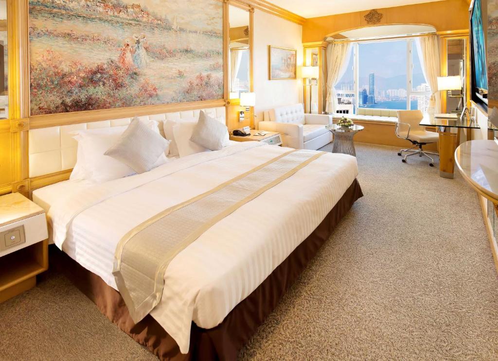 Voodi või voodid majutusasutuse Regal Hongkong Hotel toas