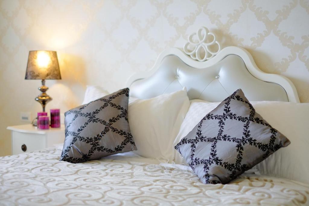 Postel nebo postele na pokoji v ubytování Bai Yun Ge Homestay
