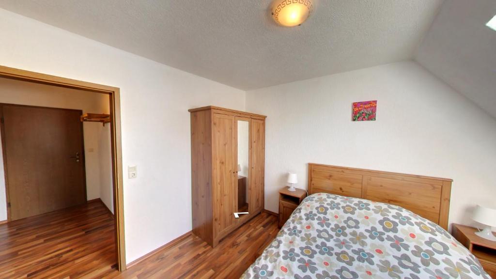 Postel nebo postele na pokoji v ubytování Haus Nova am Bollerberg