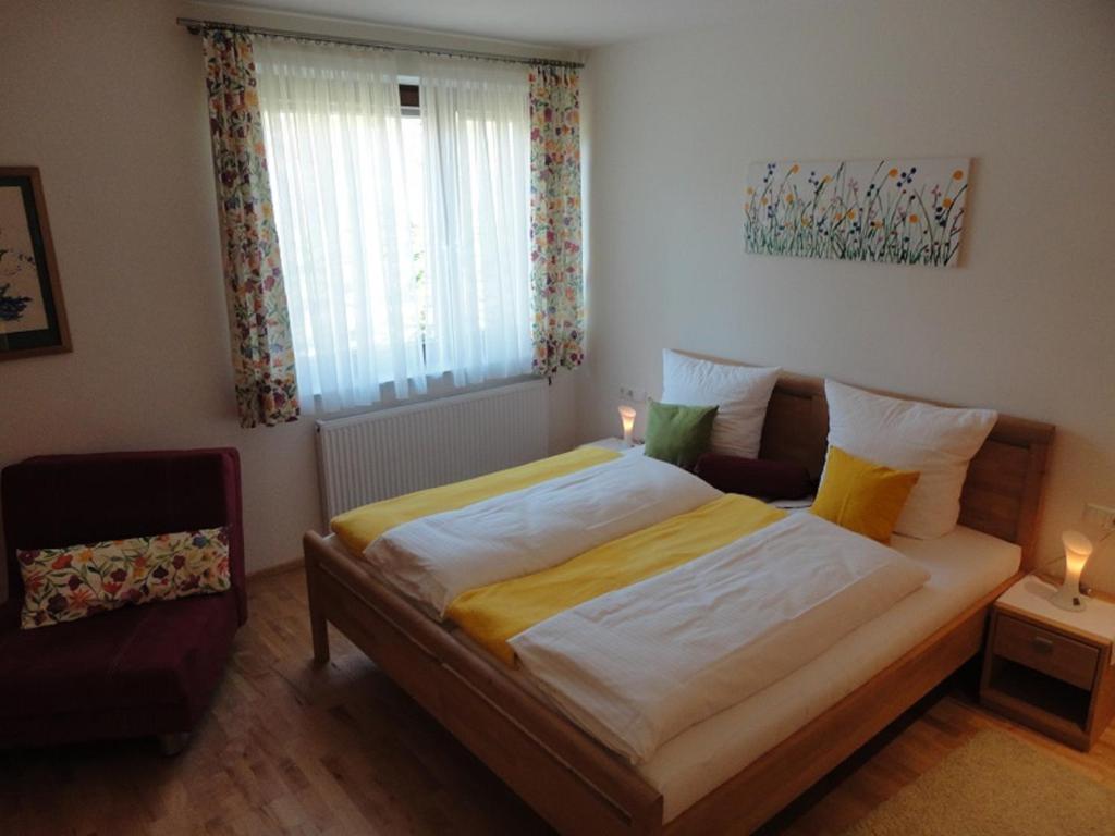 Postel nebo postele na pokoji v ubytování Gästehaus Daurer