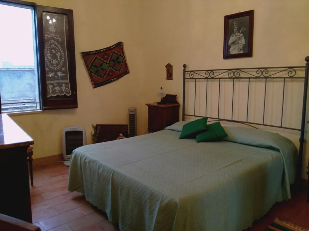 Voodi või voodid majutusasutuse Casa Bomboniera toas
