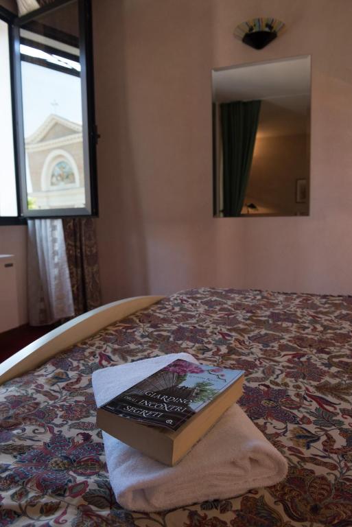 Posteľ alebo postele v izbe v ubytovaní Hotel Tessarin