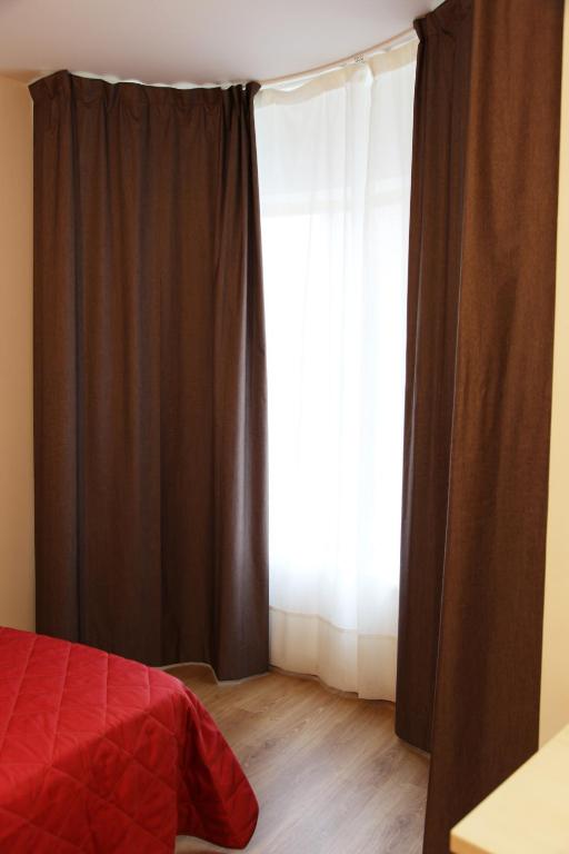 Posteľ alebo postele v izbe v ubytovaní Hostal Santel San Marcos